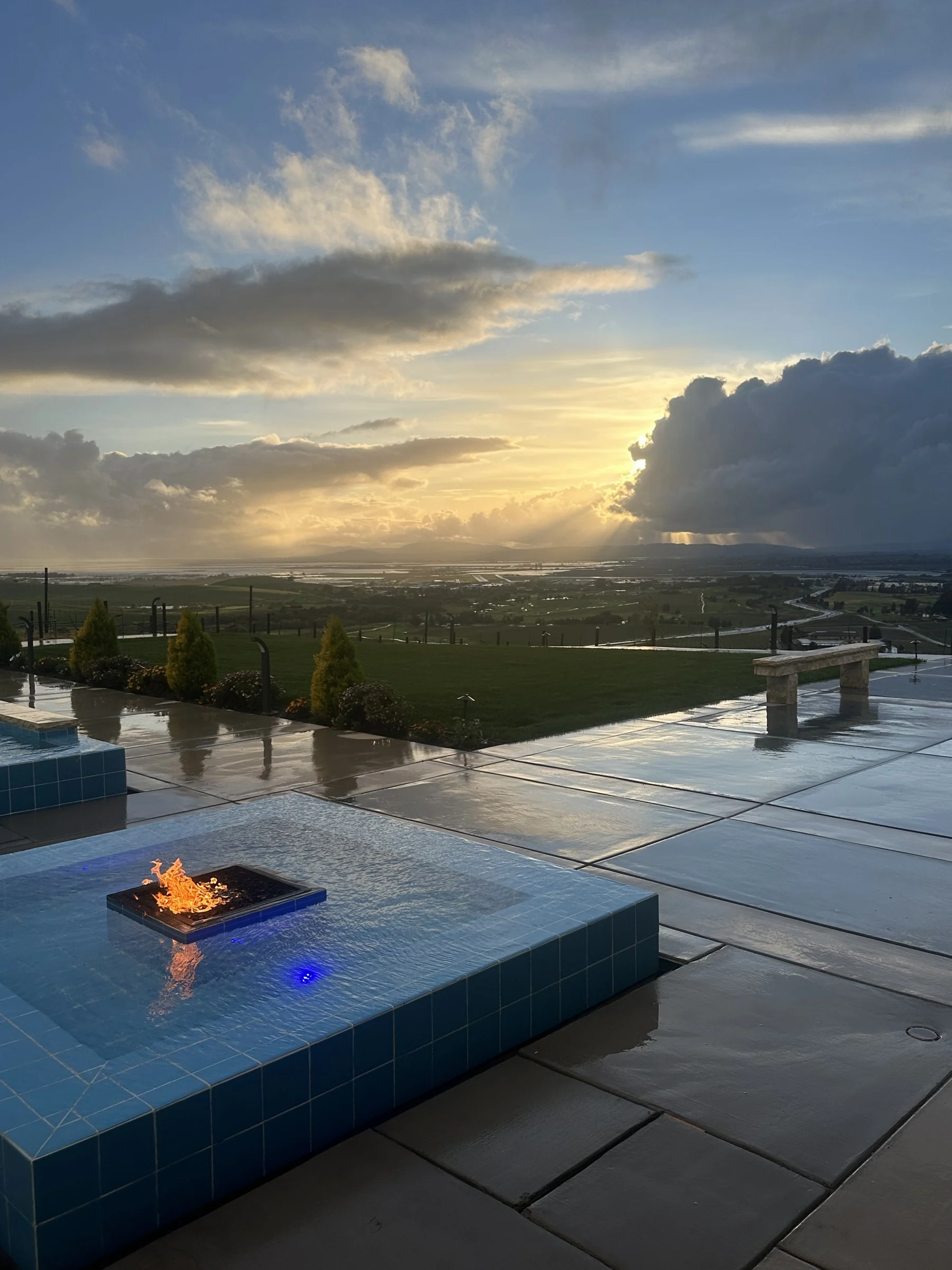 An evening sky reflected in water on the Senemar terrace